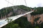 People test strength of glass bridge in China with sledgehammers - 6