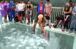 People test strength of glass bridge in China with sledgehammers - 12