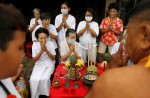 Gruesome piercing at bizarre Thai vegetarian festival - 15