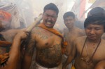 Gruesome piercing at bizarre Thai vegetarian festival - 18