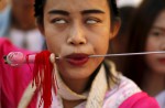 Gruesome piercing at bizarre Thai vegetarian festival - 39