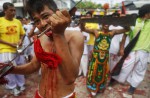 Extreme piercing for purity in Thai vegetarian festival - 27