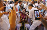 Extreme piercing for purity in Thai vegetarian festival - 39