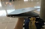 One budget airline passenger's badly damaged luggage and its contents - 3