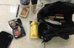 One budget airline passenger's badly damaged luggage and its contents - 7