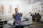 More non-Chinese in Singapore seeking help at free TCM clinics - 2