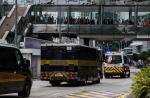 Hong Kong police grill British trader over double murder - 9