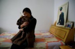 Easing of China's one-child policy: Too late for those who lost only child - 7