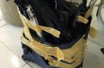 One budget airline passenger's badly damaged luggage and its contents - 0