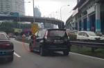 Ostrich sprints down Malaysian Highway - 12