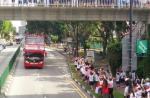 Crowds gather to catch glimpse of Joseph Schooling on victory parade - 14