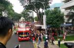 Crowds gather to catch glimpse of Joseph Schooling on victory parade - 17