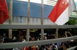 Crowds gather to catch glimpse of Joseph Schooling on victory parade - 21