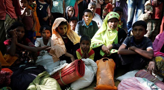Hundreds of Rohingya cross into Bangladesh, fleeing unrest
