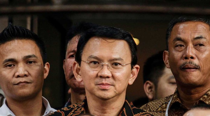 Jakarta governor named suspect in blasphemy case