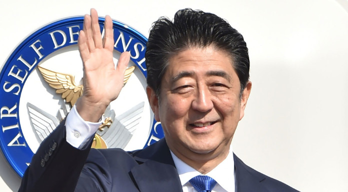 Japan's Abe heads for New York for first talks with Trump