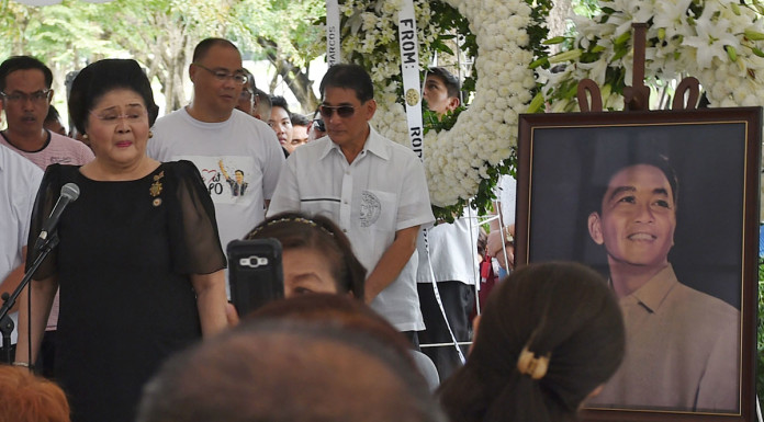 Marcos funeral a democracy wake-up call