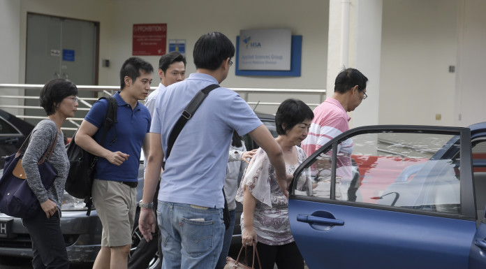 AYE accident victim's wife called siblings overseas for help while trapped in car