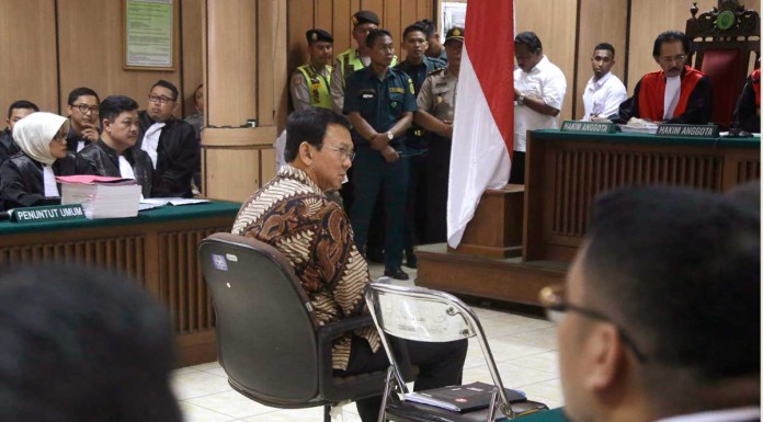 Indonesia transfixed as tearful Jakarta governor appears at blasphemy trial