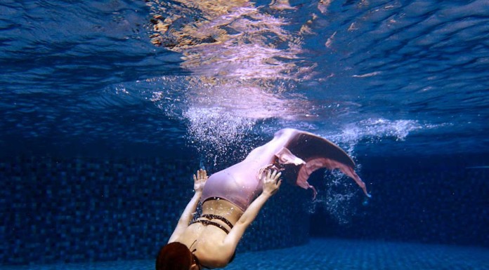 Swimmers swap legs for a tail at mermaid classes in China