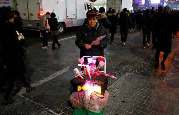 Slogans, placards and food – South Korean protests a boon for restaurants
