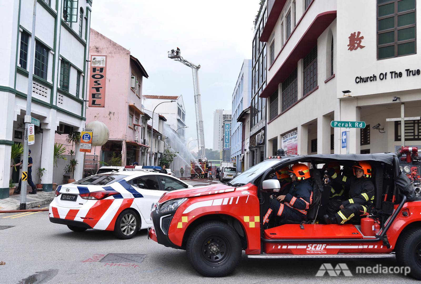 SCDF officers battle a blaze at Dickson Road in Little India