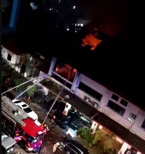 Firefighters battling blaze at 35 Lorong 14 Geylang on Jun 19, 2019.