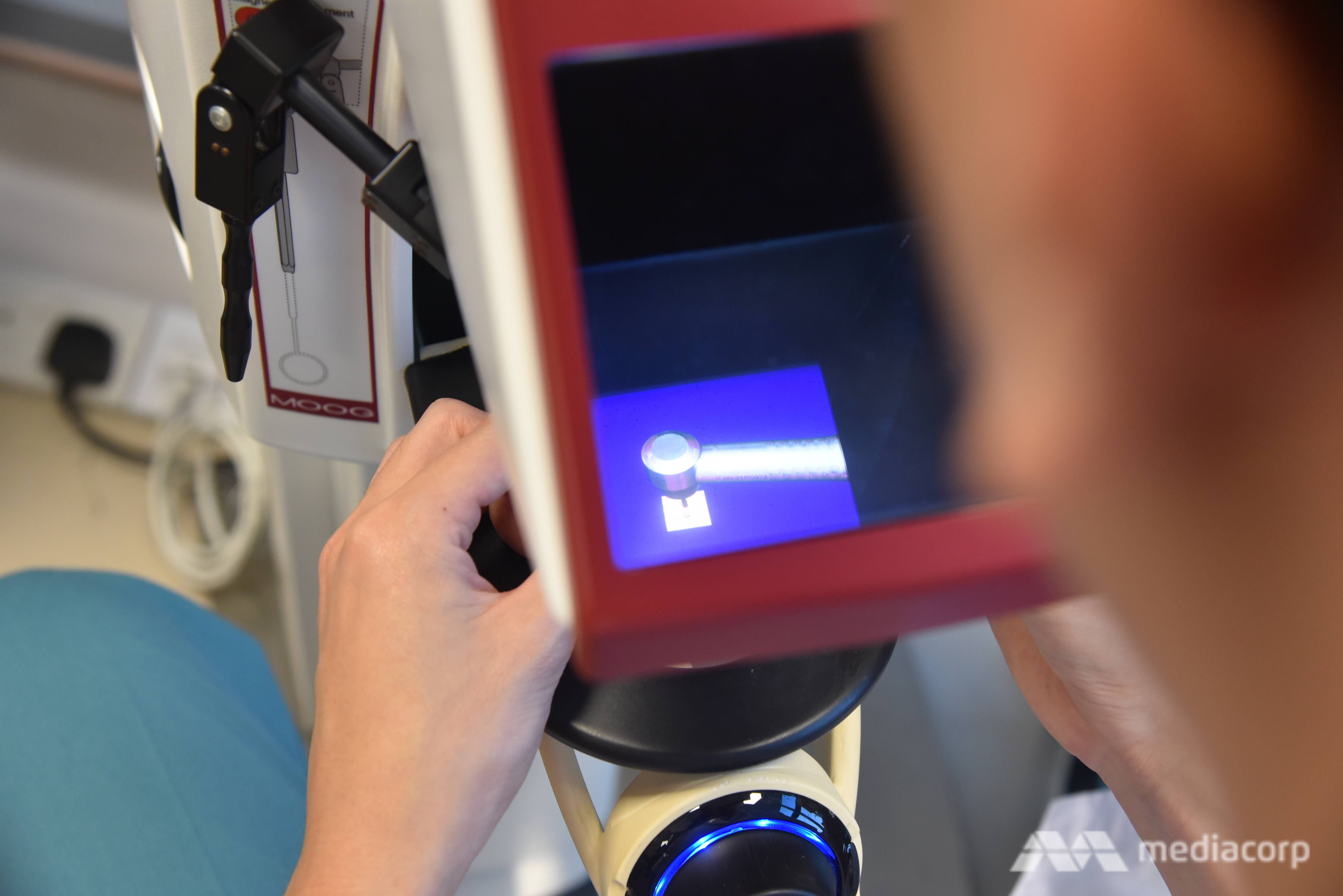 A student uses virtual reality to practise drilling a tooth