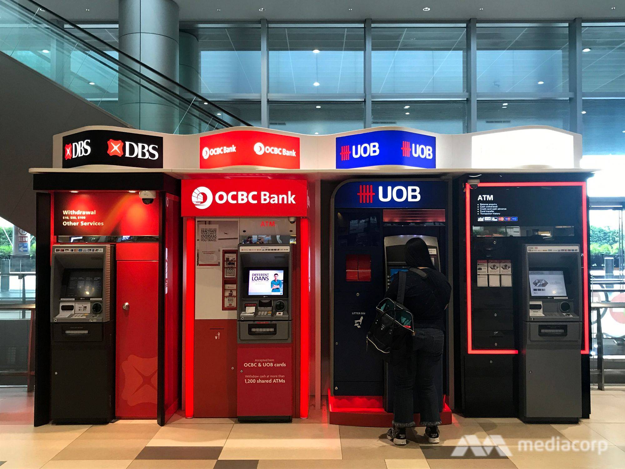 ATM machine dbs ocbc uob money cash Singapore - file photo