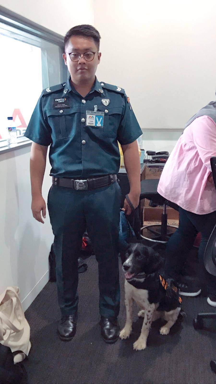 bonzo and his handler at mediacorp