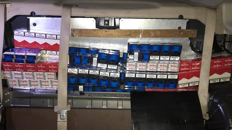 cigarettes found in the modified rear passenger seat of a Malaysia-registered car