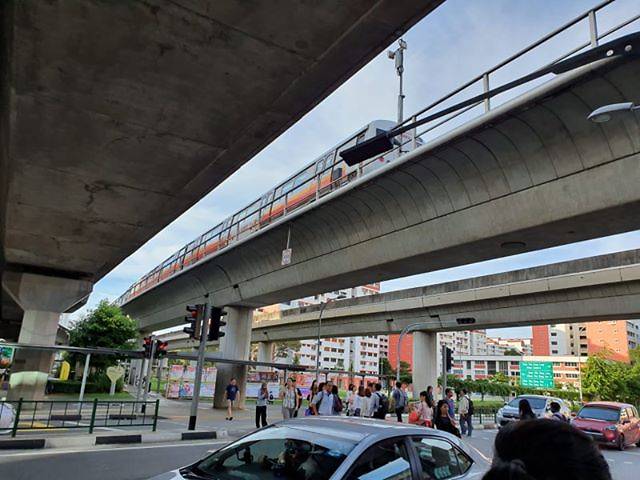 A train stationary on the tracks near Choa Chu Kang MRT station