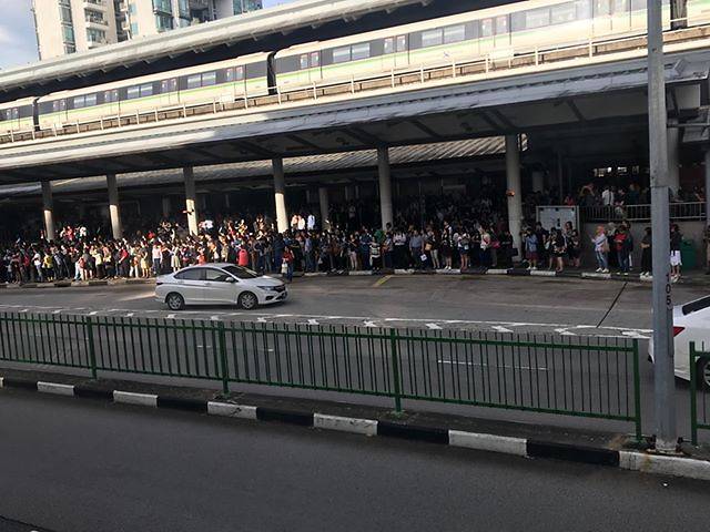 Crowds seen outside Yew Tee MRT station during a disruption on the North-South Line