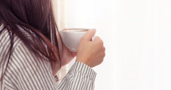 photo-of-woman-holding-cup-of-coffee-1028736.jpg