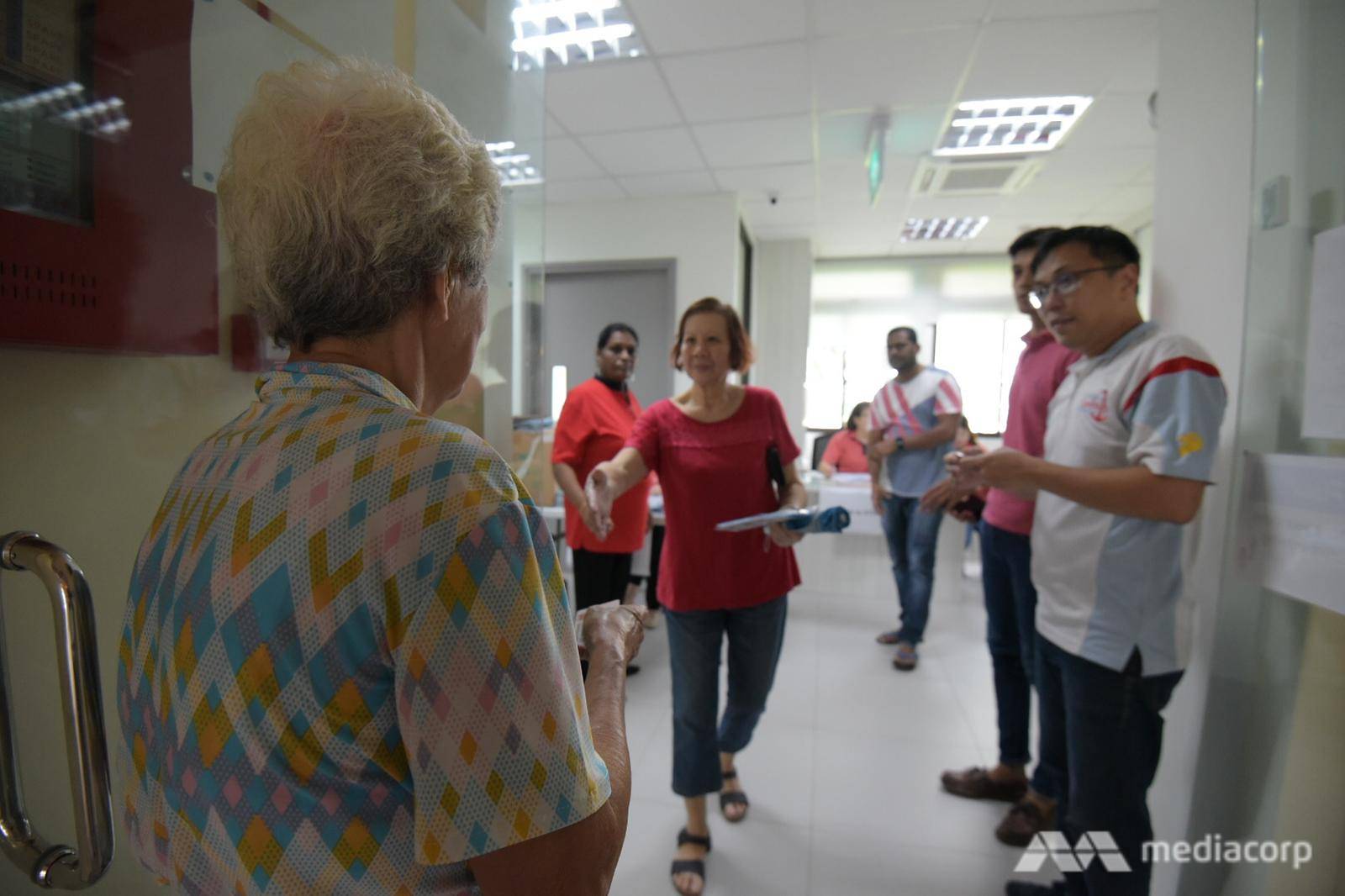 residents entering or leaving rc after collecting their masks (1)