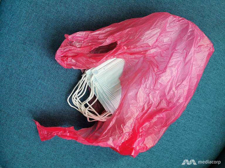 face mask in plastic bag