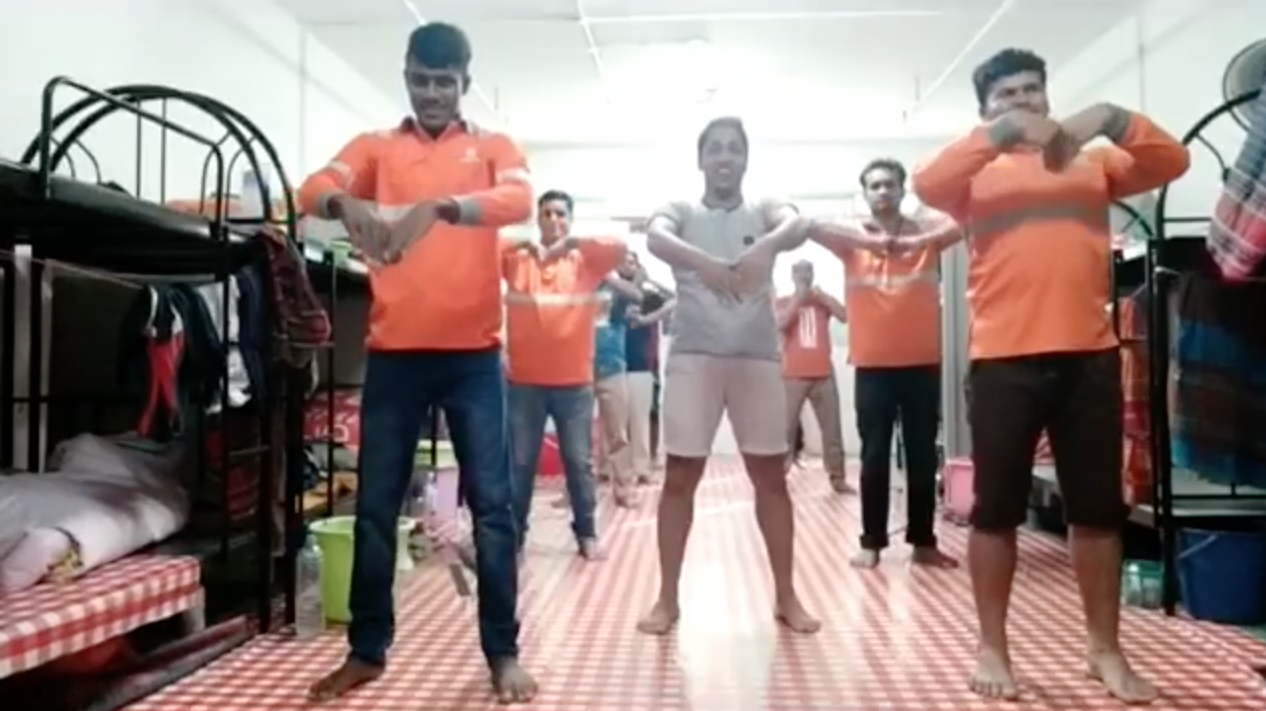 exercises workers in dorm