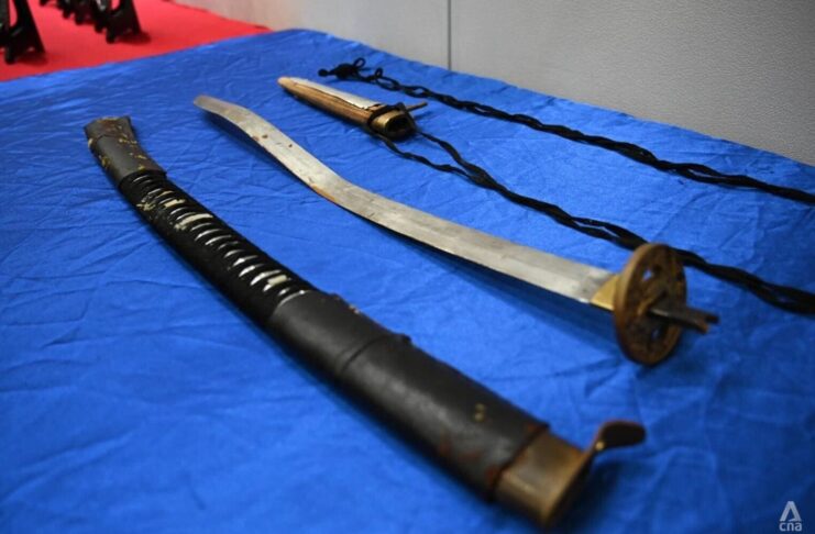 Sword Wielding Suspect Under Investigation By ISD For Sharing Militant Group Pictures Online